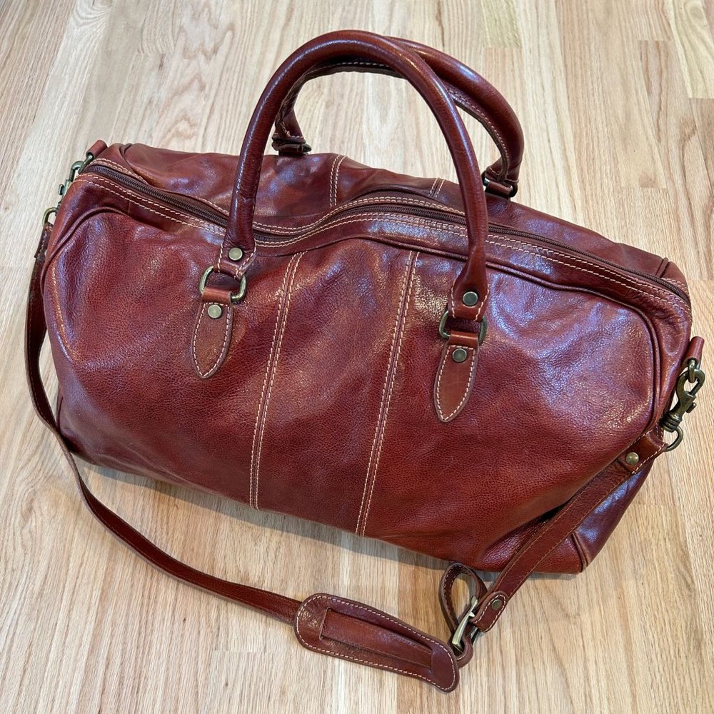 Vintage burgundy leather duffle bag